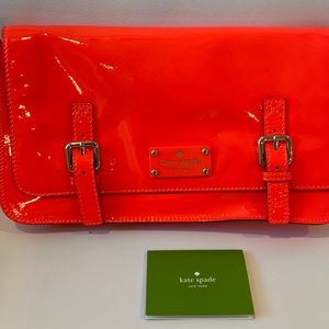 Kate spade clutch bag. NEW/ tags. MINT condition. coral/neon color. Bought $298